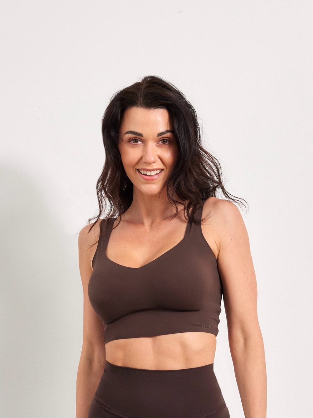 SKIMS Chocolate Brown Seamless Sports Bralette S-DD size